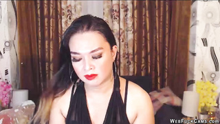 Brunette amateur in black on webcam