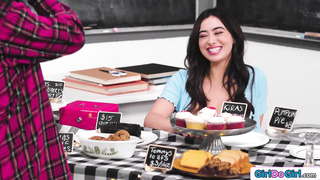 Stepmom licking stepdaughter under table