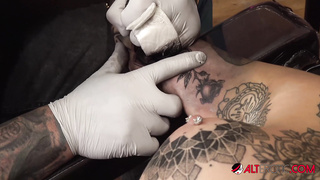 Amber Luke Milks While Getting Inked