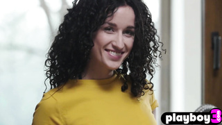 Petite curly teen posed in the kitchen