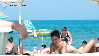 Dashing nudist hotties lie down