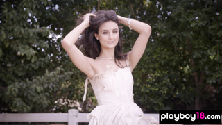 Nude latina showing her boobs on a horse