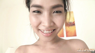 Chesty Thai dame Tittiporn disrobes down and gets banged