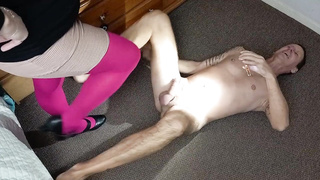 Madame in pink tights kicks stands on cock