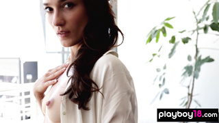 Ukrainian beauty reveals her small tits