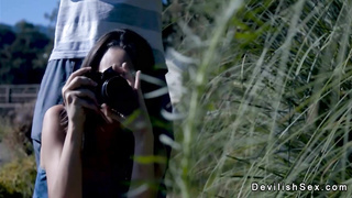 Brunette wanks and fucks huge dick outdoors