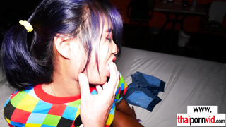 Thai teen hops onto her clients big cock