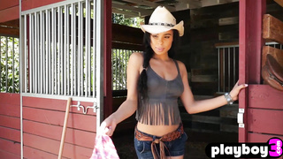 Sexy ebony MILF posing on the ranch