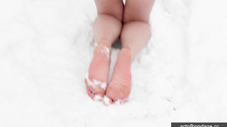 Naked barefoot Claudia tied up in the snow