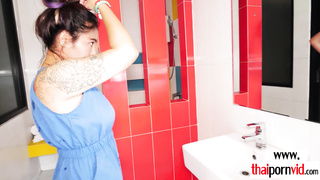 Guy fucking a Thai sluts tits and pussy