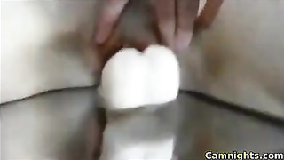 Stepsister pleasuring her dildo on webcam