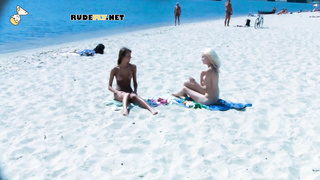 Ravishing nude beach girls tanning