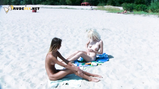 Ravishing nude beach girls tanning