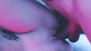 sexy blonde deepthroats a big dick in blue light 2