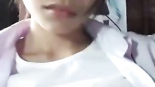 Nice youthfull Thai damsel flashes her enormous funbags and pretty muff