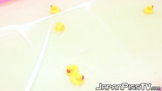 Timid Chinese honeys display off fur covered twat while urinating