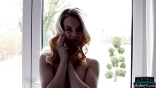 German blonde Emmi is a petite model