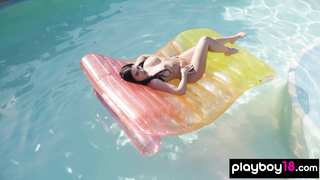 Big boobed naked babe posing in the pool