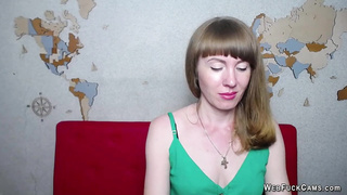 Ukrainian MILF fondles and covers tits on webcam