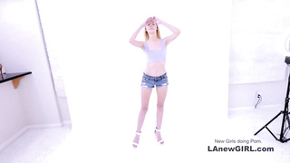 New girl tempted into lesbian lovemaking in studio