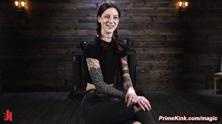 Redhead bound in a bridge position whipped