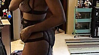 Ebony Escort Tries On Fishnets