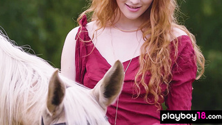 Redhead Latvian diva reveals her boobs