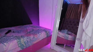 Tattooed blonde masturbating at home