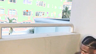 Big Tits Ebony Sucks BBC in a Public Balcony