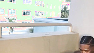 Big Tits Ebony Sucks BBC in a Public Balcony