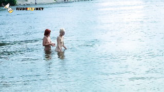 Skinny and young nudist ladies fool around on the beach