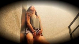 Peggy fingering in the stairwell