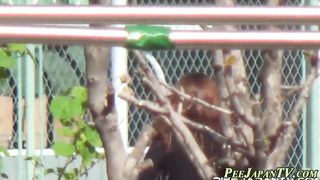 Publicly urinating asian