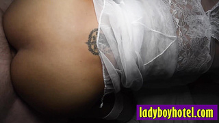 Horny Asian shemale loves big white cock