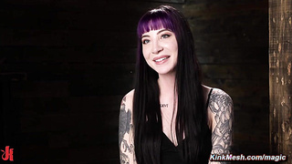 Tattooed slave suspended and flogged in dungeon