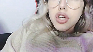 Petite Blonde with Glasses fingering her pussy