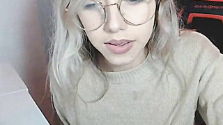 Petite Blonde with Glasses fingering her pussy