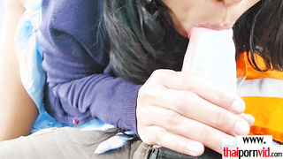 Amateur Thai MILF sucking BWC in the car