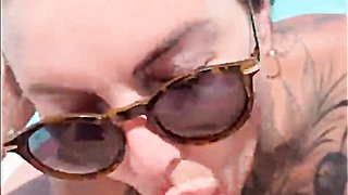 Tattooed british MILF pool blowjob