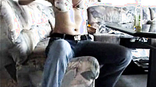 Housewife Donna sticks bottle in her cunt