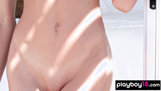 Petite asian babe spreads her long legs