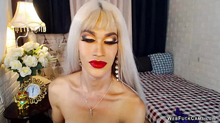 Blonde Asian shemale jerks hairy cock