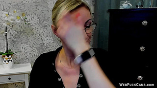 Clothed busty German MILF on webcam posing