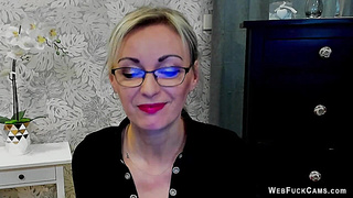 Clothed busty German MILF on webcam posing