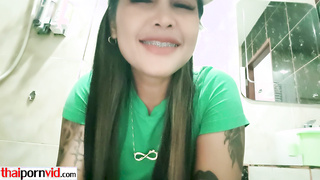 Amateur Thai teen caresses her hot pussy