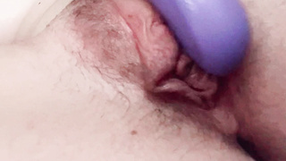 Play with my pussy with my purple vibrator