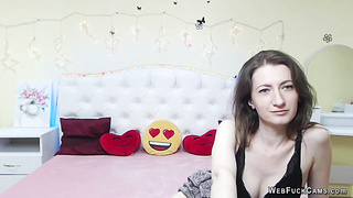 Brunette amateur babe strips to bra