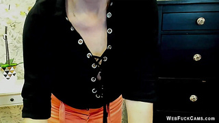 German MILF posing in mini skirt on webcam