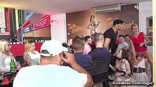 Two sex slaves fucked in public