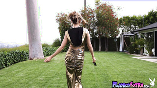 Petite blondie posing nude in the garden